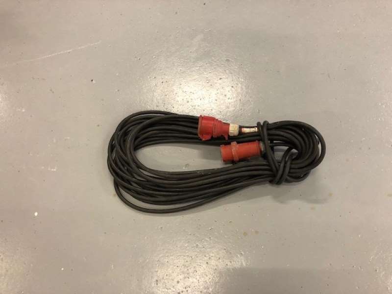 Eight shirts arranged on table in black, olive, grey, blue, white, red, mustard, and green.