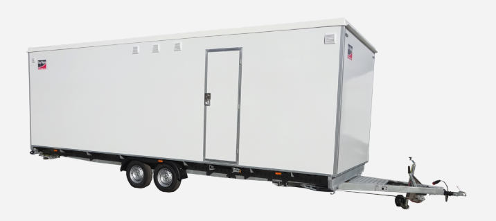 Eight shirts arranged on table in black, olive, grey, blue, white, red, mustard, and green.